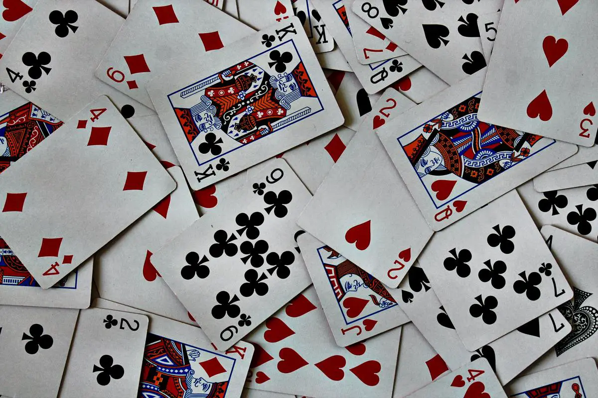 A card game where players are dealt hands and must win tricks with higher-valued cards in order to score points and win the game.