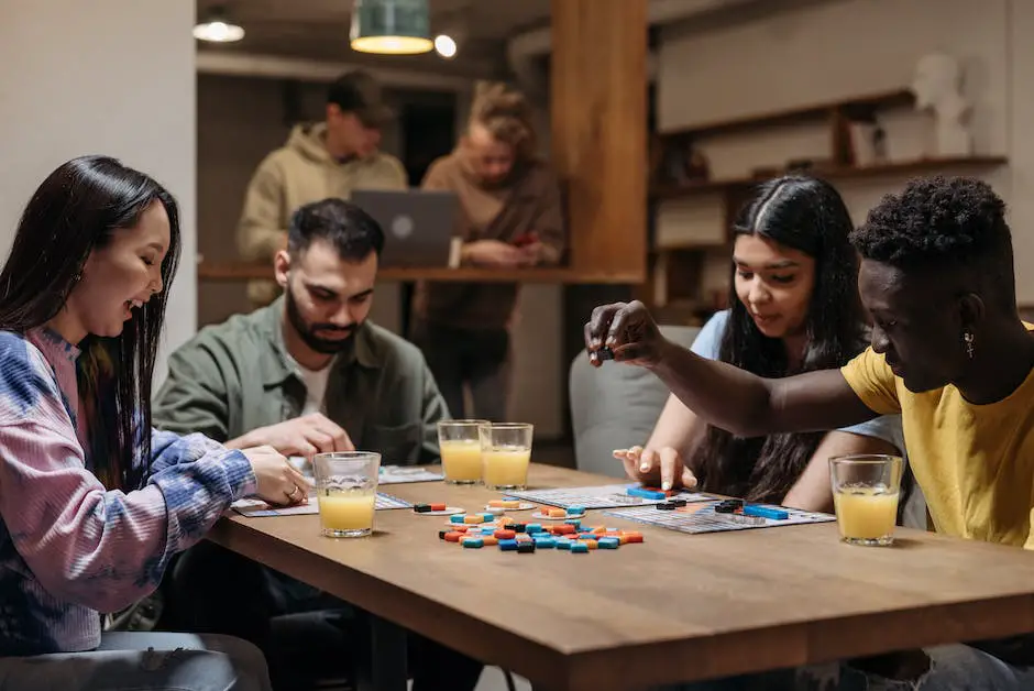 A group of players sitting around a table playing the board game Flash Point Fire Rescue. The board is laid out with tiles, and players have placed their firefighter miniatures in various rooms. Flames and smoke tokens are scattered across the board, representing a fire in progress.