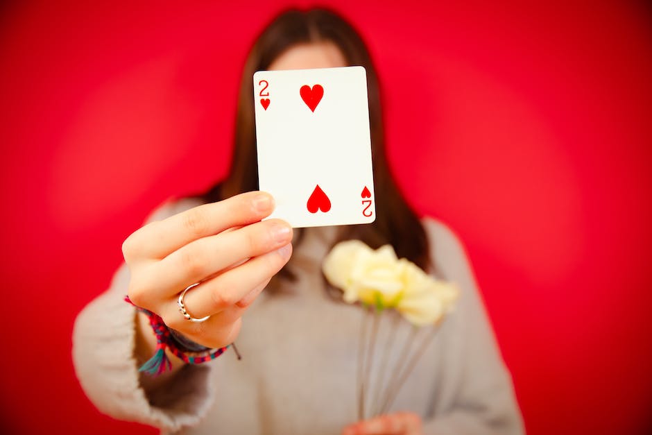 An image of a playing card with a 2 of diamonds, showing one of the cards that could be used for the Hand and Foot card game.