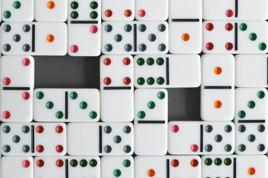 An image of two people playing dominoes on a table with a set of double-12 Mexican Train Dominoes and modified train markers.