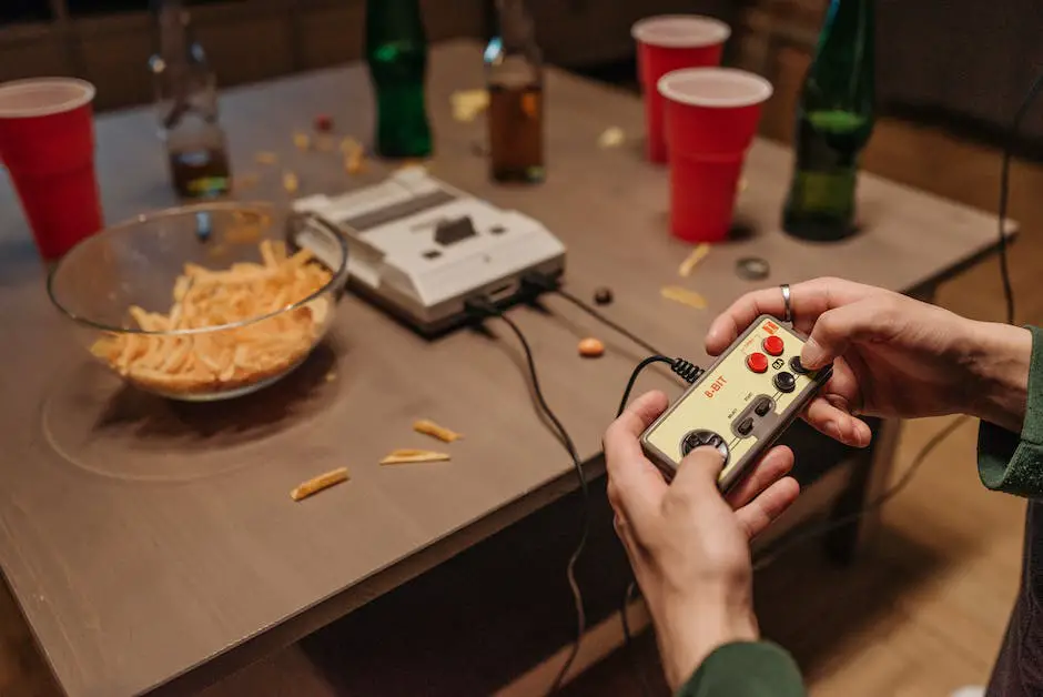 A person holding a retro Nintendo console with a big smile on their face.